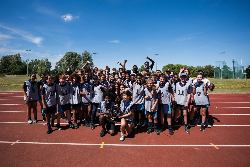 Students celebrating in a group at St Mary Magdalene Academy's Sports Day 2026